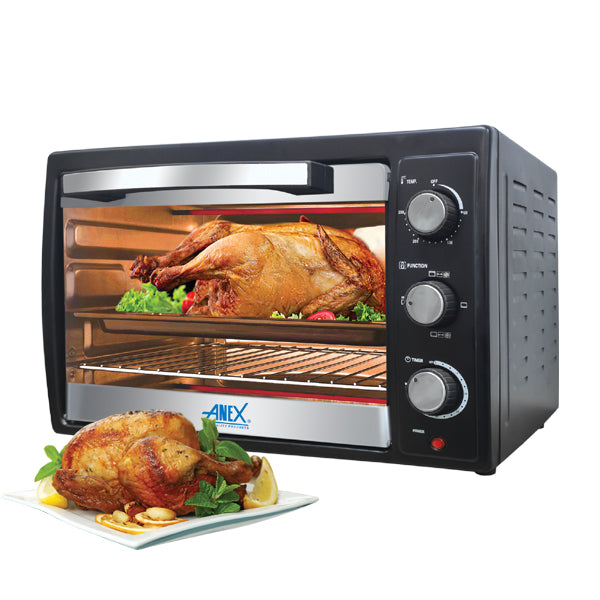 Anex Oven Toaster AG-1070 with a roasted chicken inside and another on a plate in front