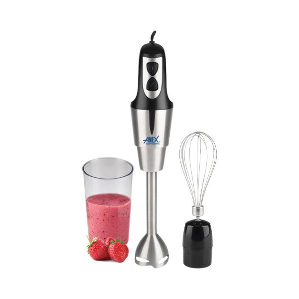 Hand blender with a glass of smoothie and strawberries on a white background